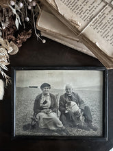 Load image into Gallery viewer, Vintage black and white holiday photograph with vicar &amp; dog