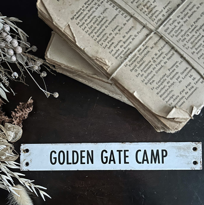 Vintage enamel typography sign 