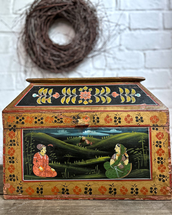 A vintage hand painted decorative folk art Indian wooden storage box chest