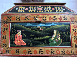 A vintage hand painted decorative folk art Indian wooden storage box chest
