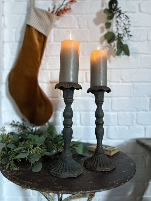 Antique cast iron heavy black fluted scalloped top pair candlesticks