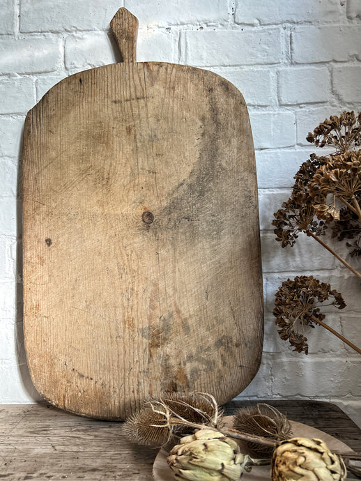 Antique rustic hand carved wooden bread board