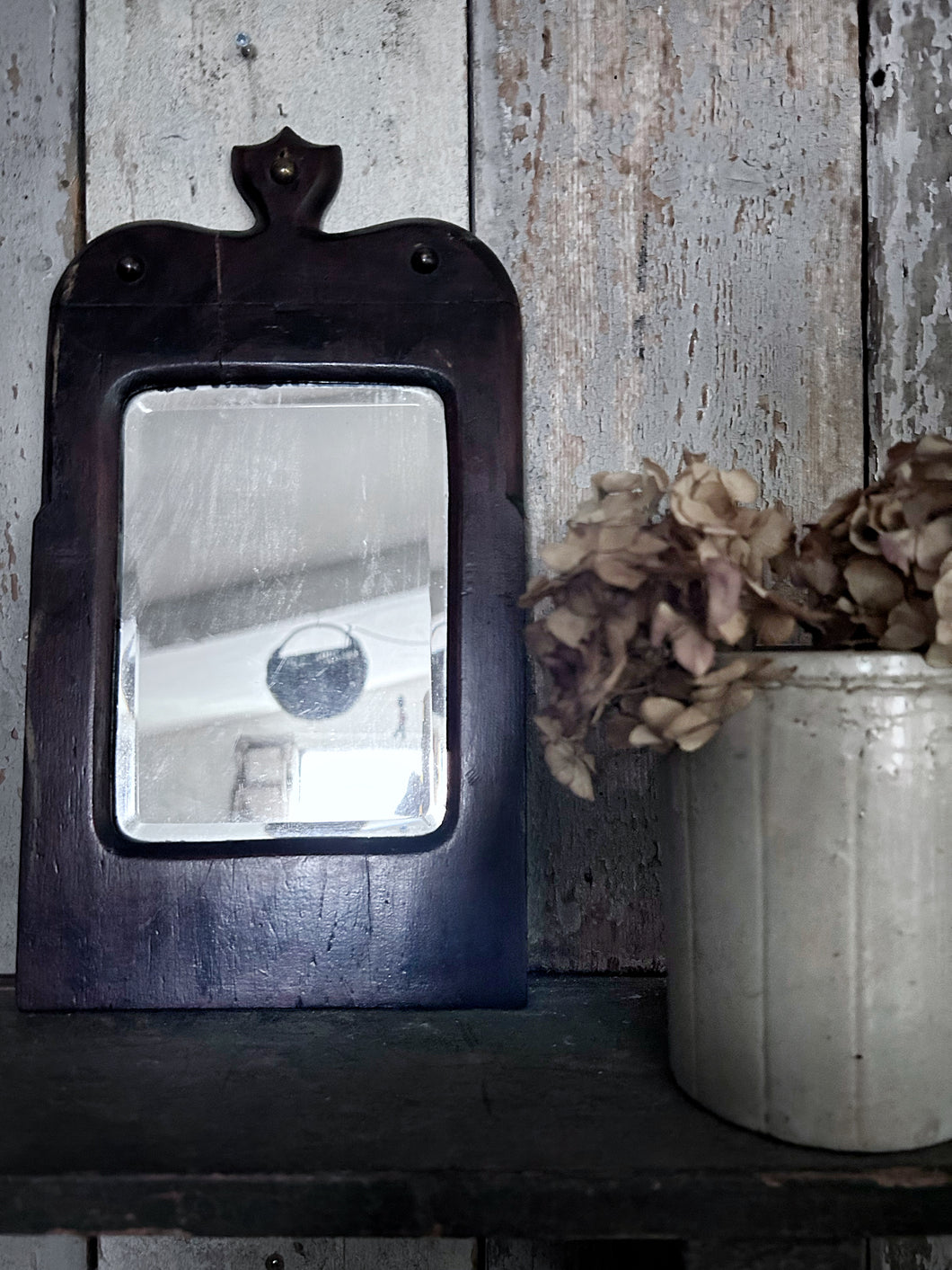 Small Georgian dark wood wall mirror with bevelled glass