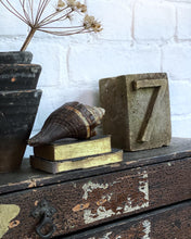 Load image into Gallery viewer, A solid stone reclaimed salvaged vintage carved cube with a 1930&#39;s font number 7