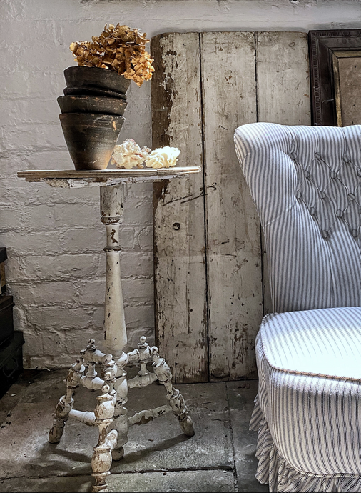 A lovely original painted antique French tripod leg side table