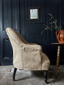 A French Antique Napoleon III slipper back hessian covered arm chair