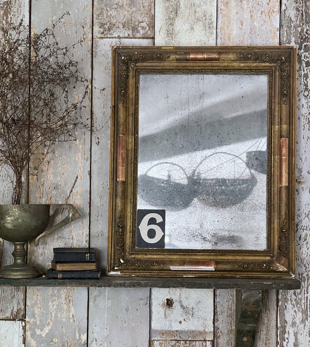 A French Vintage Antique Gilt Framed Mirror with foxed glass plate