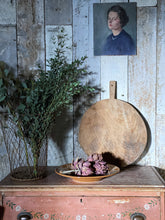 Load image into Gallery viewer, A vintage circular round rustic European hand carved bread serving board