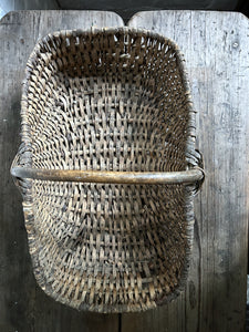 A French Vintage Wicker hand crafted foragers market basket with bent wood handle