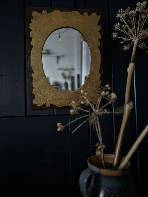 A pretty decorative vintage wooden wall mirror with fret work detail in gold