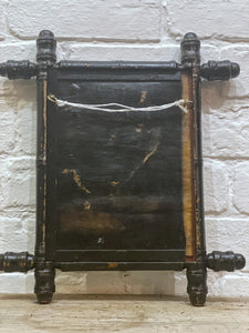 A Vintage black painted Oxford Cross Faux bamboo Mirror