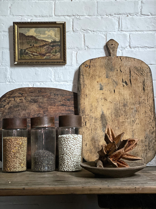 A Vintage Rustic Wooden European Bread Serving Board