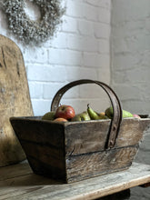 Load image into Gallery viewer, This lovely rustic vintage French wooden trug with a recycled handle made from an old bicycle wheel, which was used by grape harvesters on the vineyards, for collecting grapes.