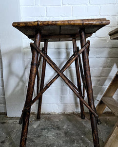 A Victorian antique bamboo side table