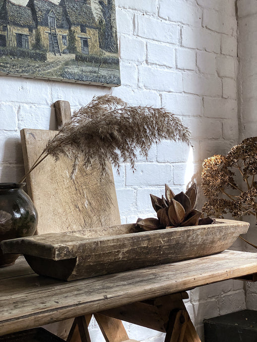 A rustic Vintage wooden European dough bowl