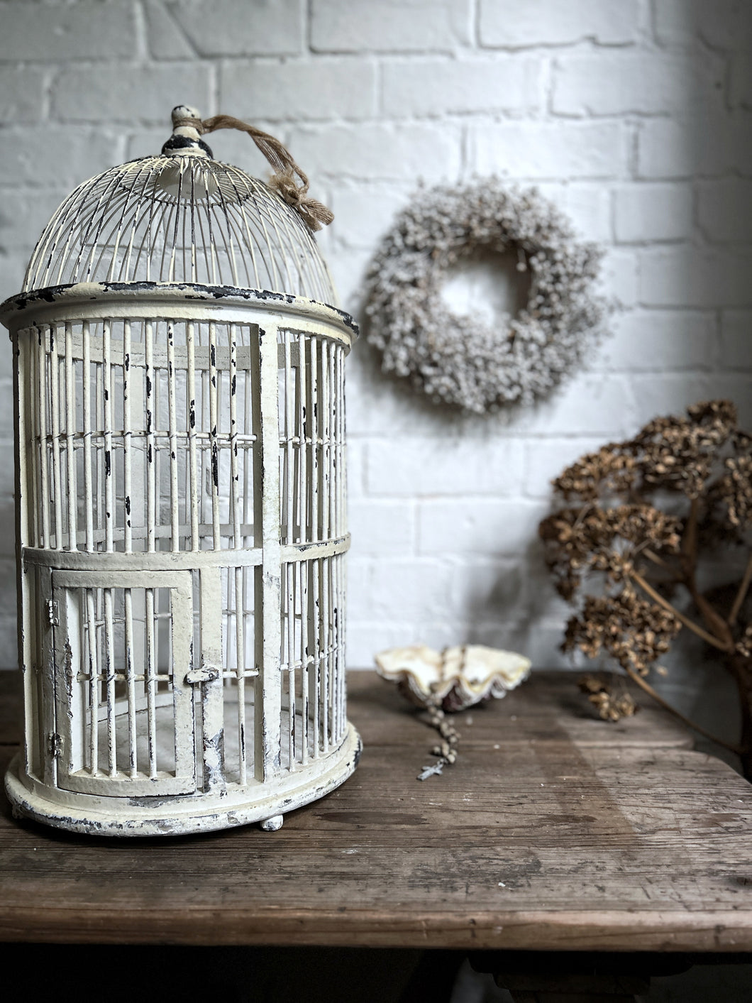 A white Decorative Vintage style bird cage