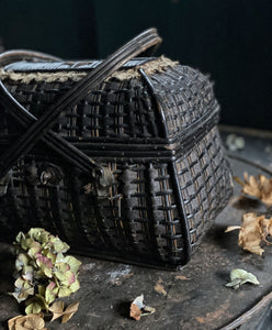 This beautiful Vintage French dark woven wicker & cotton ribbon basket, would have been used to transport birds or eggs back from the market.  It is beautifully made and has a delicate detail of lace around the top and cross over handles.