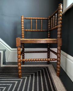A Victorian wooden Bobbin turned chair with rush seat