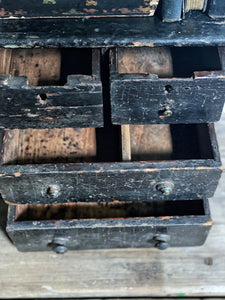 An antique Scratch built apprentice piece set of small table top drawers