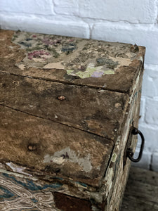 A beautiful vintage wallpapered wooden storage chest