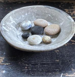 A vintage grey soap stone bowl