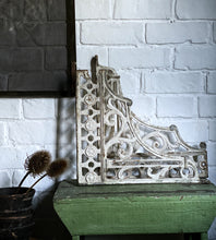 Load image into Gallery viewer, This pair of large Victorian cast iron wall brackets are beautifully decorative and would make a statement of any shelf.