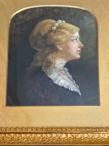 An early 20th Oil painting portrait of a lady in original gilt frame