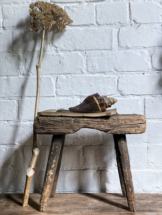 A Rustic and Worn Primitive Antique Milking stool