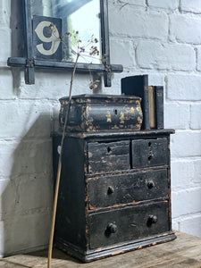 An antique Scratch built apprentice piece set of small table top drawers