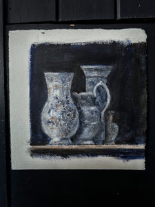 A still life study painting in gouache in deep inky blues