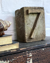 Load image into Gallery viewer, A solid stone reclaimed salvaged vintage carved cube with a 1930&#39;s font number 7