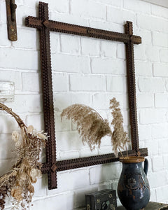 A Large Tramp Art Antique dark wooden frame