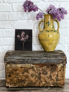 A beautiful Vintage Decorative wooden trunk overlaid with layers of vintage wallpaper