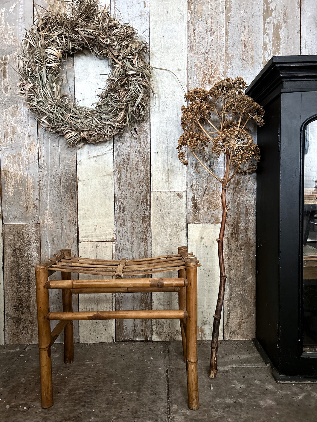 A vintage bamboo bench seat stool
